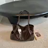 Bolsa Tote de Moda Tendência 2026 Outono Nova Vintage Feminina de Ombro Grande Capacidade Texturizada para o Dia a Dia Bolsa de Axila