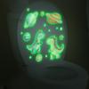 Nuevo Mg-Ym011 Dibujo Animado Mundo Dinosaurio Planeta Luminoso Inodoro Baño Inodoro Adhesivo Decorativo Autoadhesivo para Pared