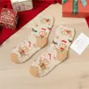 Calcetines de Navidad de coral de otoño e invierno, calcetines de suelo cálidos para el hogar de terciopelo medio, calcetines de Navidad de Papá Noel