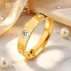 Anillo de circonia popular en línea, no se decolora, de oro de 18k, anillo de titanio de alta gama para parejas hombres y mujeres, anillo de diamante de moda