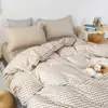 Juego de ropa de cama a cuadros minimalista estilo japonés INS de cuatro piezas, funda de edredón, sábana, juego de tres piezas para dormitorio