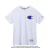 Camiseta de Manga Corta de Algodón Puro Unisex 2026 Nueva Camiseta Bordada Holgada Ins Marca de Moda Estilo Japonés Hong Kong Top Verano