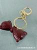 Accesorios para llavero Accesorios de regalo creativos Colgante de lazo rojo vintage Colgante para colgar en el bolso Rojo angora Niña