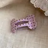 Pinza para el pelo ovalada geométrica de acrílico estilo coreano con lunares, con un diseño único y elegante, perfecta para uso casual, para ir al trabajo y como accesorio versátil para el cabello.