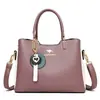 Bolso texturizado nuevo para mujer 2026, Bolso de moda para madre de mediana edad, Bolso de mano retro de cuero suave, Bolso de hombro cruzado
