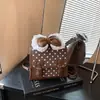 Bolsa de mão casual transfronteiriça para mulheres, novo modelo 2026, estampa de bolinhas, mochila simples de lona