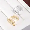 Suministro Exclusivo Transfronterizo de Anillos Ajustables con Diseño Simétrico de Hoja de Plátano de Moda con un Toque de Lujo Ligero e Incrustaciones de Circonita