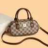 Bolsa de mão estilo retrô, em formato de almofada, para mulheres, nova coleção 2026, moderna e versátil, bolsa de ombro ou bolsa transversal, com design de estampa de alta qualidade, bolsa quadrada pequena