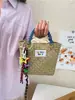 Bolso de Mano de Bloques de Color Estilo Coreano 2026 Bolso de Cesta de Paja Bolso Tejido a Mano para Vacaciones en la Playa Bolsos para Mujer