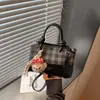 Bolsa de Mão Xadrez Transfronteiriça para Mulheres 2026 Nova Tendência Moda Bolsa de Ombro Verão Bolsa Balde Transversal para o Dia a Dia
