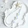 Cadena Minimalista para Teléfono con Perlas y Lazo, Correa de Muñeca, Cadena de Mano, Portacámaras y Llavero para Mujer