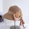 Sombrero de pescador de ala corta de paja con cinta de lazo elegante estilo francés para mujer, sombrero de paja versátil y elegante para el verano, sombrero tipo cubo para protección solar en vacaciones