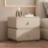 Mesita de noche pequeña moderna y minimalista para uso doméstico, hecha de madera maciza, de color crema, de alta gama, cuero de lujo ligero, con características de almacenamiento e instalación