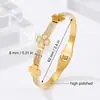 Europa y Estados Unidos venta al por mayor transfronteriza para mujer sentido de alta gama adornos de mano no se decoloran joyería trébol de cuatro hojas chapado en oro pulsera de acero de titanio