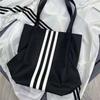 Bolso de lona de gran capacidad estilo perezoso para mujer, nuevo bolso de hombro para otoño e invierno 2024, bolso de mano para estudiantes de moda.