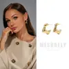 Fábrica de Pendientes Largos Irregulares Retorcidos Líquidos Populares de Tiktok Marca Mesurely Hechos de Materiales Ultraligeros Ecológicos