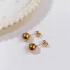 Aretes de Tuerca Geométricos de Estrella de Acero Titanio con Bolas de Acero Grandes y Pequeñas de Moda Simple al por Mayor de Fábrica de Venta Caliente Aretes Perforados Mujeres
