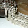 Perlas sueltas redondas de ABS de alta calidad con agujero pasante, pintadas como imitación de perla, directamente de la fábrica para hacer a mano collares y pulseras DIY