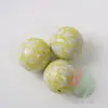 20 piezas 25mm canicas de vidrio de porcelana blanca sésamo amarillo 2.5cm damas crema amarillo Punto de sésamo bola 400g