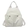 Mochila ligera estudiante gran capacidad doble hombro bolsa nicho estilo coreano 2026 Otoño nuevo simple ins bandolera mujer