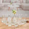 Punto Fabricante Fuente Mayorista Botella de Aromaterapia en Barra Volátil Vidrio Transparente Engrosado en Relieve Jarrón Pequeño Hogar Sencillo