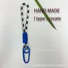 [Em estoque na fábrica] Cordão de nylon trançado à mão multicolorido com mosquetão durável, corda para chaves, acessório anti-perda para bolsa