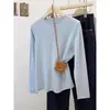 Camiseta básica de punto color verde menta para mujer, estilo coreano otoño e invierno, color liso, manga larga, top interior suave y acogedor