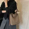 La popular bolsa de axila de este año es la nueva moda de verano 2026, tejida, elegante, de gran capacidad, para el hombro y cruzada