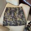 Toma real: Falda midi retro estilo Hong Kong Otoño 2026 con estampado floral, elegante, estiliza la figura, moderna, línea A, bodycon, falda corta