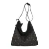 Bolsa feminina estilo casual 2026 novo modelo, estampa de estrela, nicho de outono, bolsa de ombro com estampa de leopardo super popular, grande capacidade, adequada para o trabalho