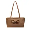 Bolso de hombro coreano de nicho para mujer, alto valor estético, estilo vintage, bolso tote de gran capacidad, popular para el trabajo y los desplazamientos