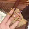 Pulsera de Trébol de Cuatro Hojas con Abalorios de Círculo Completo de Diseñador Italiano Versión Estrecha de Verano Pulsera Exquisita Elegante de Estilo Lujo Ligero