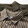 Camisa de Verano 2025 Amigable con la Piel de Manga Corta con Cuello y Rayas Finas Unisex Casual Estilo Japonés Moderna Holgada de Media Manga
