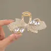 Lujoso pasador de pelo de lazo totalmente incrustado de diamantes y chapado en oro para mujer, exquisito clip de tiburón de tamaño grande, elegante accesorio para el cabello, venta al por mayor desde el fabricante
