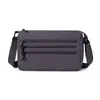 2026 Nova Moda Primavera Cedo Simples Impermeável Nylon Bolsa Feminina Bolsa de Ombro Versátil Leve Bolsa Transversal com Múltiplos Compartimentos