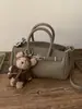Moda Feminina Nova Primavera 2026 Transfronteiriça Bolsa de Mão Simples Bolsa Platina Versátil Ombro Transversal Bolsa para o Dia a Dia