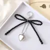 Nuevo Colgante Creativo de Cadena Colgante con Lazo de Perlas para Bolso, Funda de Teléfono, Llavero, Adorno, Exquisito Accesorio de Regalo Pequeño