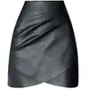 Elegante falda de mujer 2026 primavera/otoño nueva adelgazante de cuero PU corta de cintura alta para petite falda de línea A falda ajustada al cuerpo