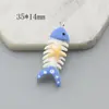 Accesorios DIY serie estilo océano resina cangrejo pantuflas delfín hueso de pez ancla botella a la deriva colgante
