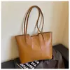 Bolso de Estilo Coreano Transfronterizo para Mujer 2026 Nuevo Bolso de Hombro Único Simple Retro Bolso Tote Texturizado para Clase y Viaje