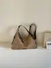 Bolsa Tote Grande Capacidade Transfronteiriça Feminina 2026 Novo Estilo Fashion Chic Nicho para o Dia a Dia Bolsa de Ombro Único Bolsa HOBO de Braço