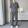 Traje casual de verano cómodo y transpirable para hombre, cuello suelto, manga corta, pantalones largos elásticos, conjunto deportivo de dos piezas para hombre