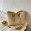 Bolsa feminina grande popular estilo vintage transfronteiriça, nova moda de verão 2026 bolsa de ombro para o dia a dia, bolsa tote casual