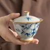 Juego de té de cerámica kung fu con diseño de bambú azul y blanco, taza de té gaiwan y bandeja de té para uso doméstico, juego completo, caja de regalo de té de lujo ligero