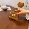Billetera Corta Versátil Elegante Retro de Moda Transfronteriza para Mujer 2026 Nueva Alta Apariencia Muchos Compartimentos para Tarjetas Billetera de Mano