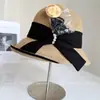 Sombrero de Pescador de Color Contrastante de Moda con Lazo Protección Solar para Mujer Verano Casual Versátil Sombrero de Cubo Vacaciones Viaje Sombrero de Paja Tendencia