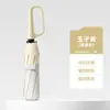 Paraguas creativo con hebilla de anillo de apertura manual al 70% de descuento, protección solar, doble uso para lluvia y sol, paraguas de negocio con recubrimiento negro, sombrilla de estilo japonés simple al por mayor