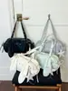 Bolso coreano de nicho transfronterizo, gran capacidad, bolso de hombro tipo tote para mujer de lunares de alta gama, versátil y elegante