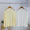 Camiseta de Manga Larga Estilo Nuevo Tencel Protección Solar Delgada Versión Coreana Versátil Holgada Cuello Redondo Top Caliente Ajuste Holgado