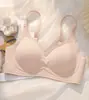 Roupa íntima feminina sem costura com aparência natural, com suporte macio, bojo fixo, push-up para seios pequenos, contenção lateral dos seios, sutiã anti-queda Venda por Atacado